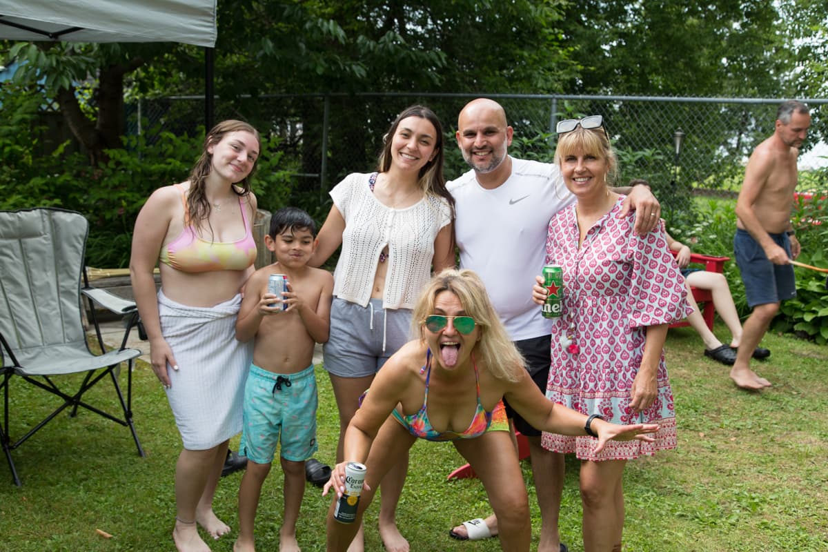 Family and friends gathered in the backyard on a summer afternoon